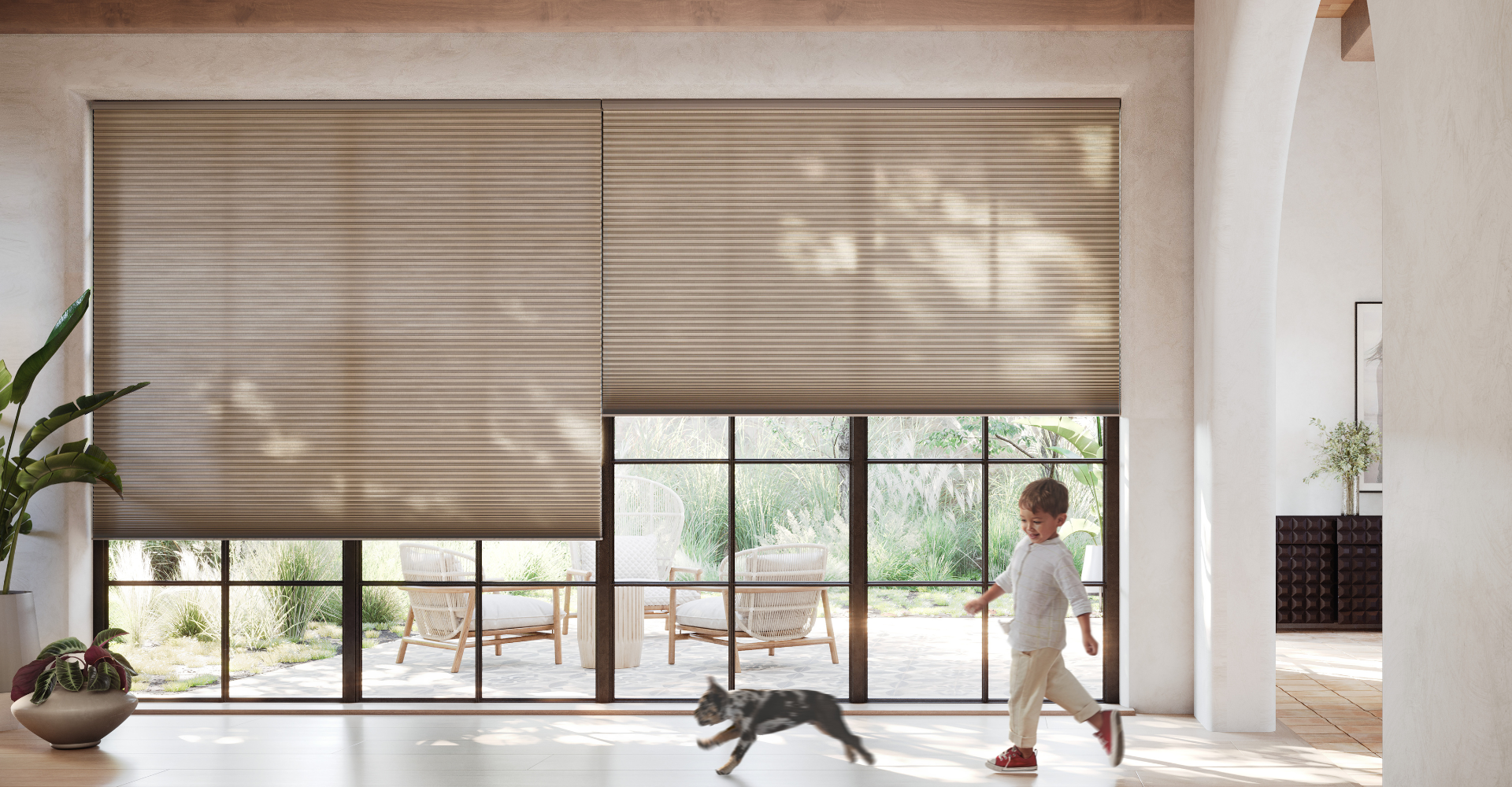 Dad pushing Daughter in Cardboard box on Hardwood Floors in Home.